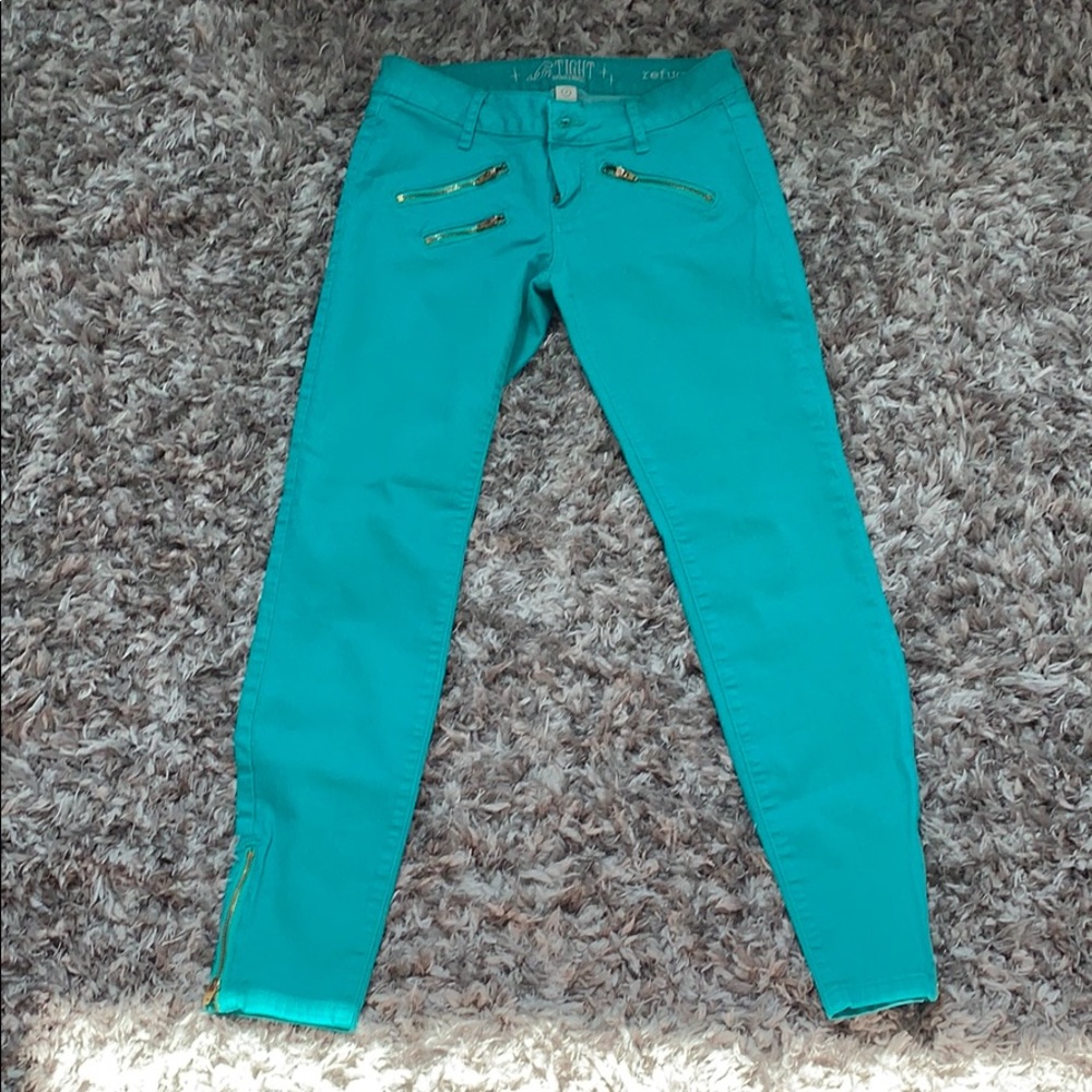 Turquoise skinny jeans size two